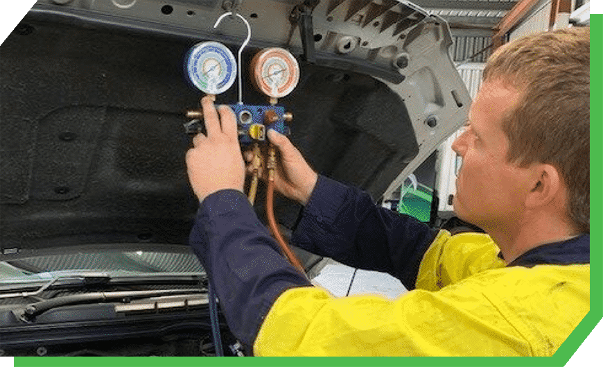 Car mechanic fixing car air conditioning in Mackay