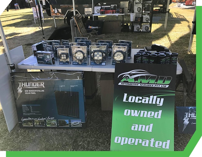 Auto parts and products displayed by AMD Automotive Services in a market in Mackay, QLD